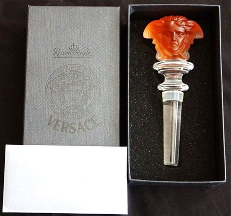 versace amber bottle stopper.